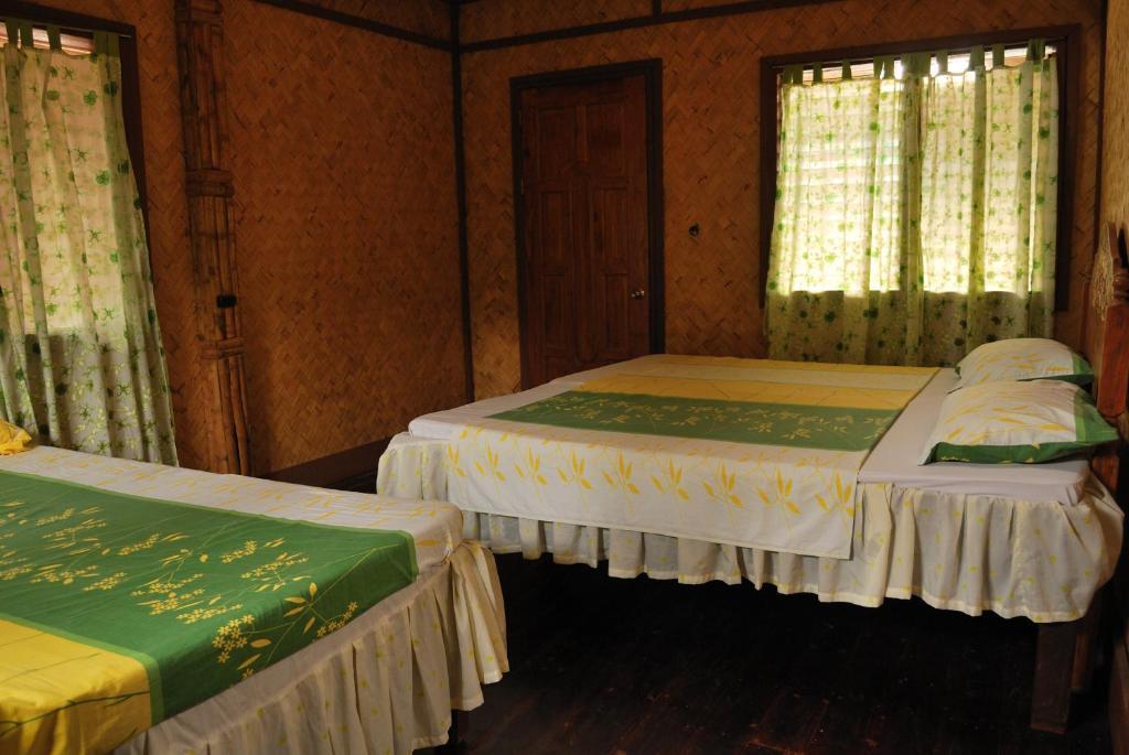 Lally And Abet Beach Cottages Эль-Нидо Номер фото