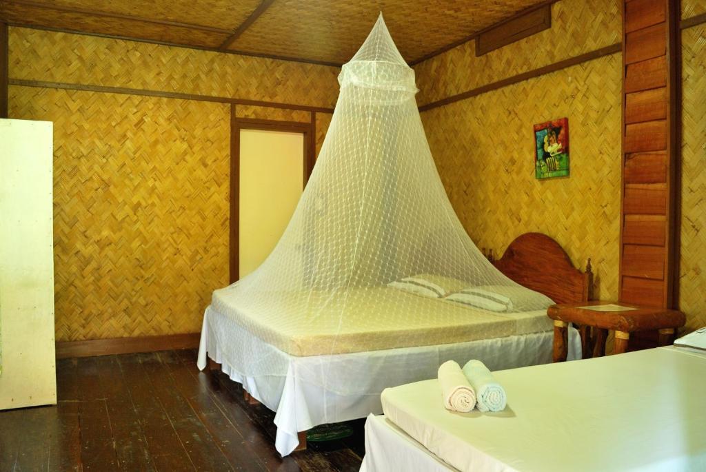 Lally And Abet Beach Cottages Эль-Нидо Номер фото