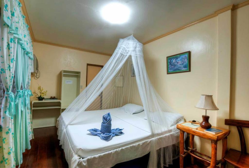 Lally And Abet Beach Cottages Эль-Нидо Номер фото